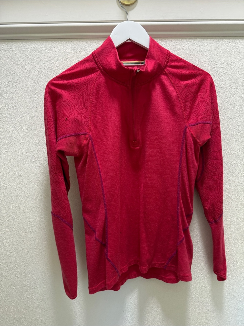 Smartwool Women's pink wool base layer.